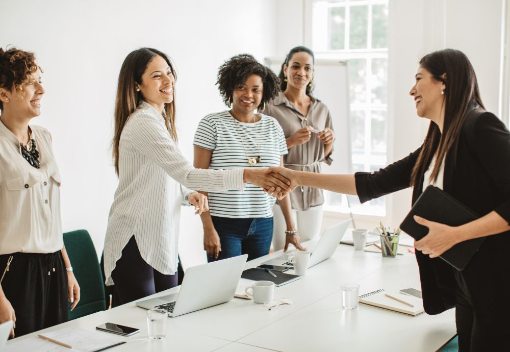 A person joining a new team in the office