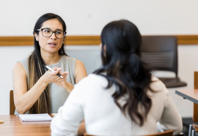 2 people having a meeting to discuss performance during probation