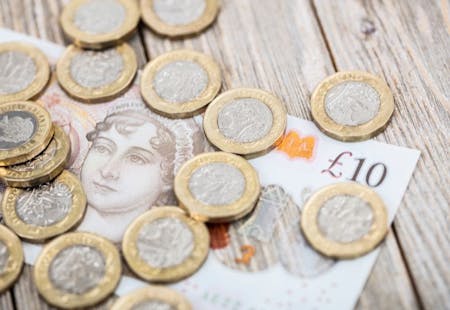 British money A collection of British coins and ten pound note