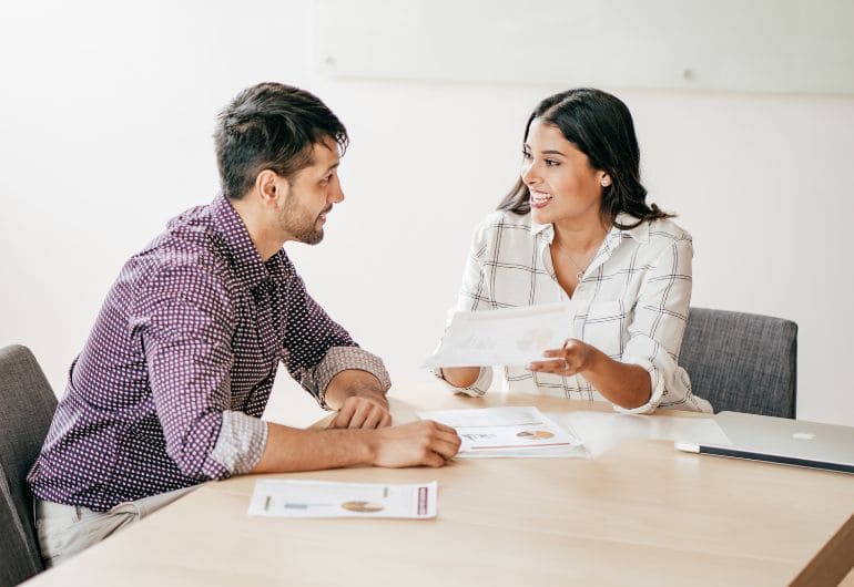 2 people negotiating over pay