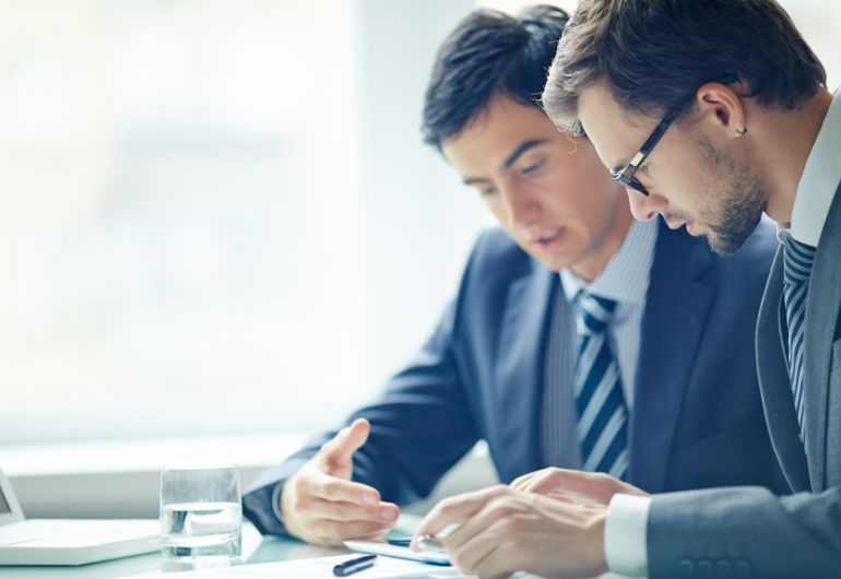 two people having a meeting over probation period