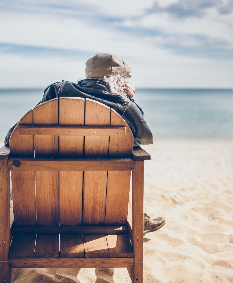 man relaxing on beach