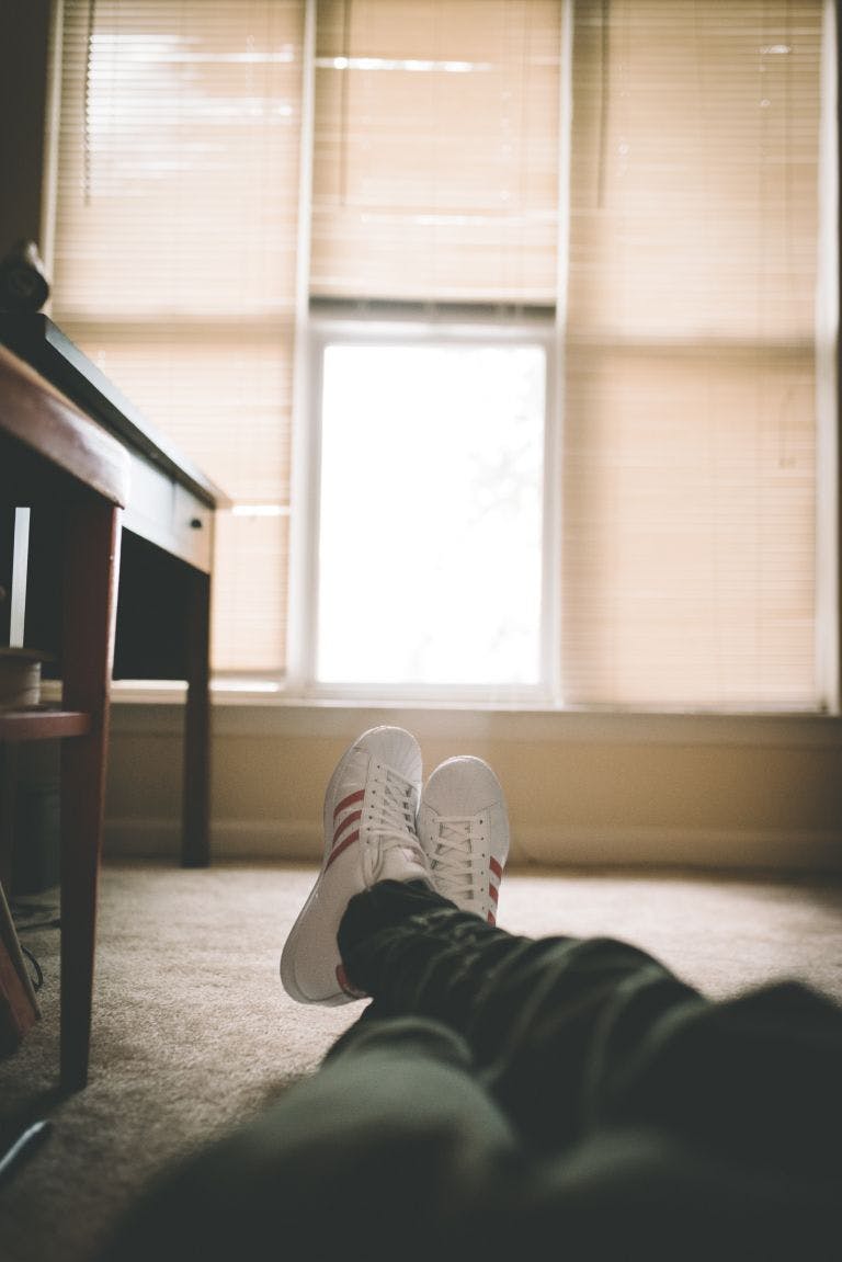 feet up in trainers