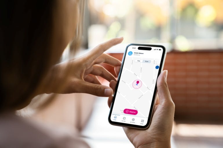 Clock in and out app woman using clock in and out app, Blip on mobile phone
