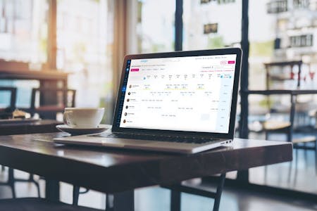 shifts and rosters Staff shift and roster planning software on a laptop
