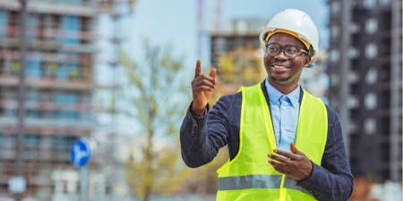 Risk assessment steps A man in a safety vest and hard hat points, illustrating the stages of a risk assessment process in a construction setting.