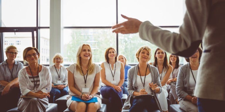 Group of employee's participating in a workshop for employee development.
