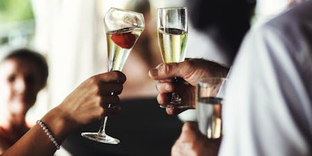Drinks in the office/workplace Drinking glasses of champagne