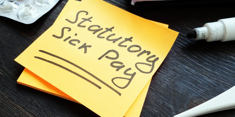 Statutory Sick Pay A post-it note saying "Statutory Sick Pay"
