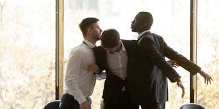 Gross misconduct at work Two male employees engaged in a fight at work with another male trying to break it up.