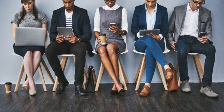 Internal Recruitment Group of employees waiting for an internal job interview.