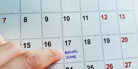 Annual leave calendar An image of a paper calendar with annual leave written onto a particular date