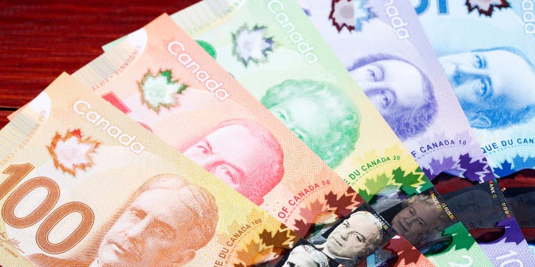 A variety of Canadian dollars layed out