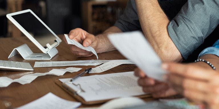 Employee expenses and receipts being uploaded to a system for payment
