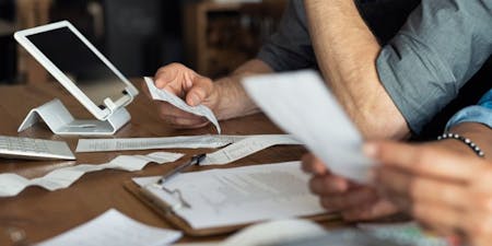Managing employee expenses Employee expenses and receipts being uploaded to a system for payment