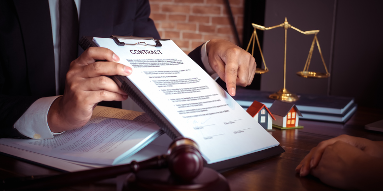 Employment law documentation A manager handling an employment contract document