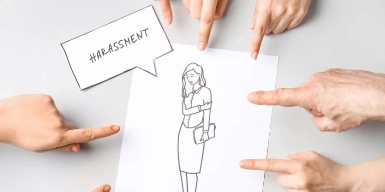 Workplace Banter VS Unlawful Discrimination A drawing of a woman being harassed