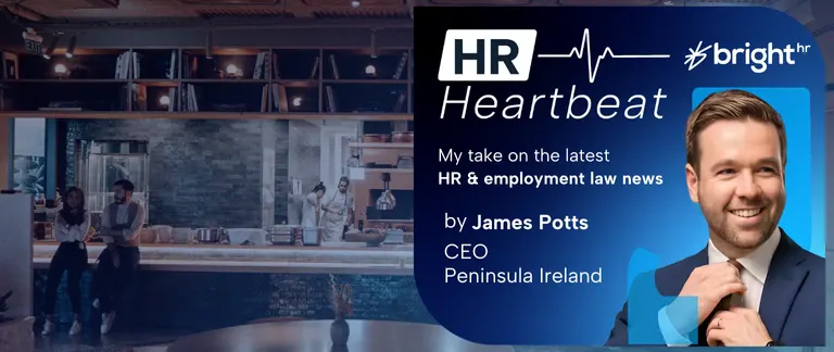 A restaurant with workers within
