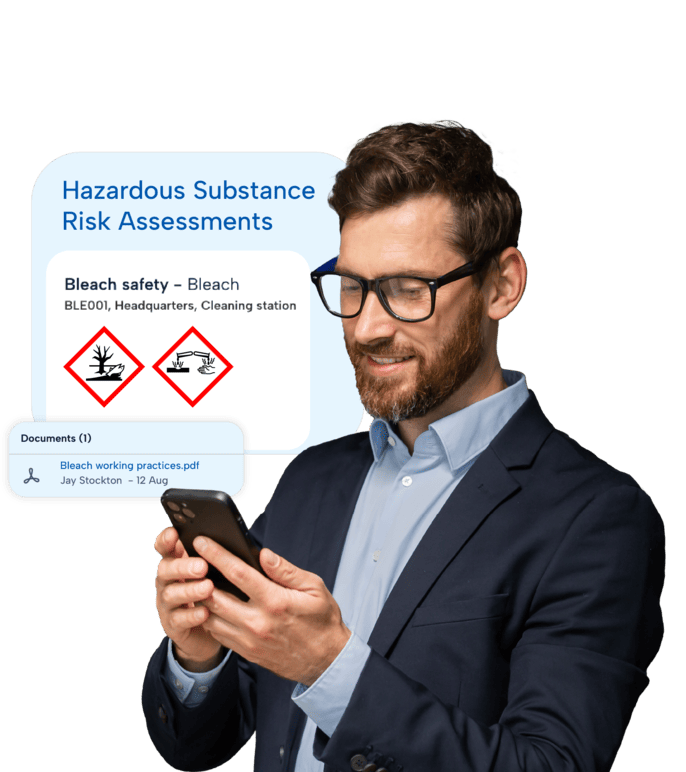 Man on phone using BrightSafe's Hazardous Chemical Health Assessment tool.