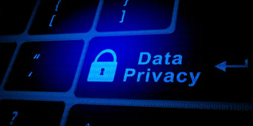 An image of a computer keyboard with data privacy written  on the enter key