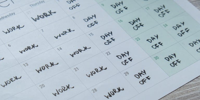 Compressed hours Calendar view of a month marked with a 4 day working week a form of compressed hours