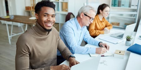 Employees happy working in an office because of the flexibility of their working hours