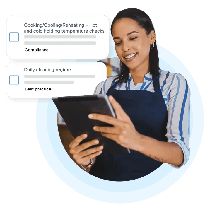 Food safety checklist Women holding tablet checking a food safety checklist