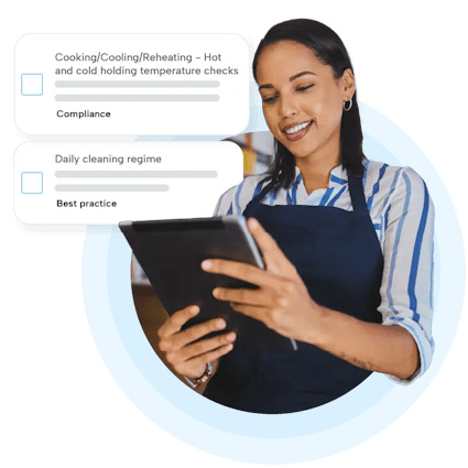 Food safety checklist Women holding tablet checking a food safety checklist