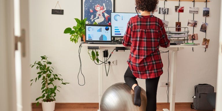 Reasonable Adjustments Employee working at a standing desk