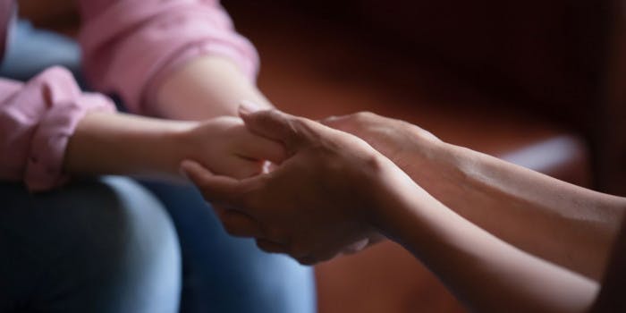 People holding hands People holding hands