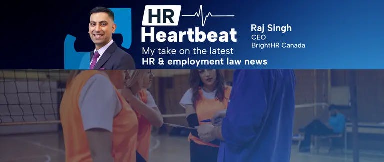 volleyball coach and 3 players standing in front of a net