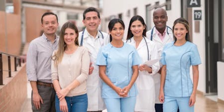 Healthcare staff smiling happily