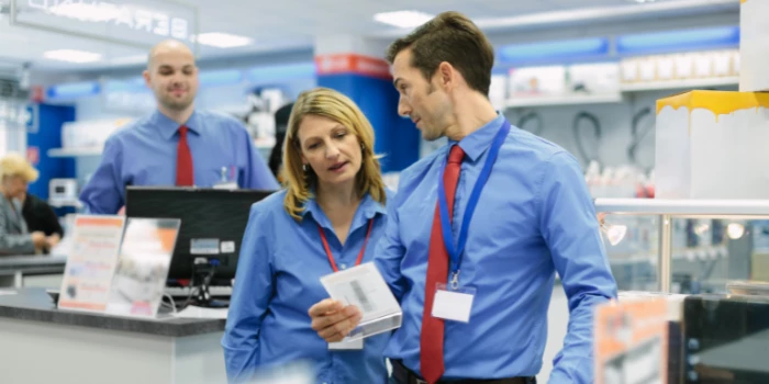 Retail store manager with staff