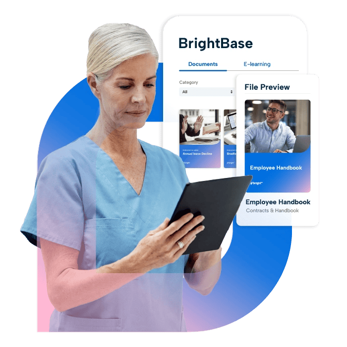 A woman in a blue scrubs is holding a black tablet, with an image of BrightHR's BrightBase documents to the right of her. A woman in a blue scrubs is holding a black tablet, with an image of BrightHR's BrightBase documents to the right of her.