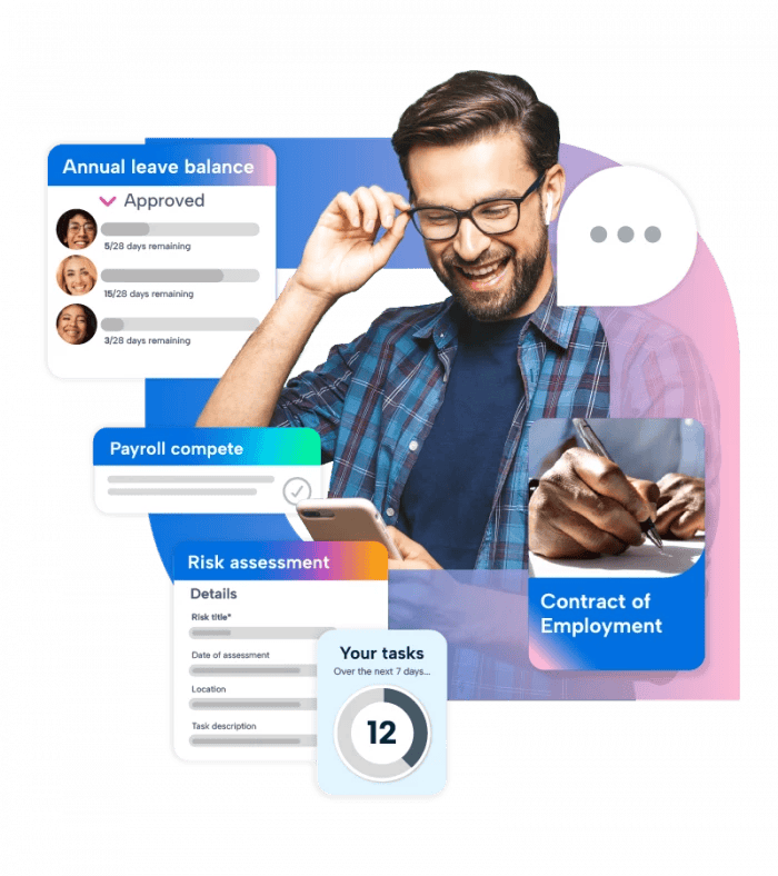 A man with glasses is smiling while holding a phone to his ear. He is wearing a blue plaid shirt and has a ring on his finger. The man is interacting with a social media platform that has a blue background with white text. The platform has a white background with a pink background and a blue background with white text. There are three buttons on the platform: a "Like" button, a "Share" button, and a "Comment" button. The man is interacting with the "