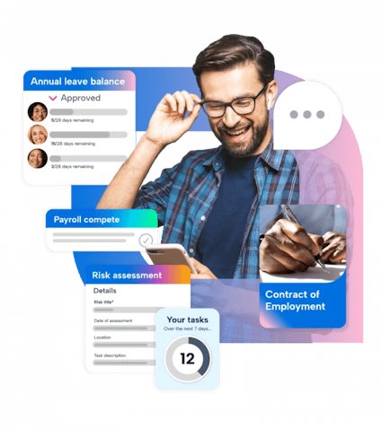 A man with glasses is smiling while holding a phone to his ear. He is wearing a blue plaid shirt and has a ring on his finger. The man is interacting with a social media platform that has a blue background with white text. The platform has a white background with a pink background and a blue background with white text. There are three buttons on the platform: a "Like" button, a "Share" button, and a "Comment" button. The man is interacting with the "