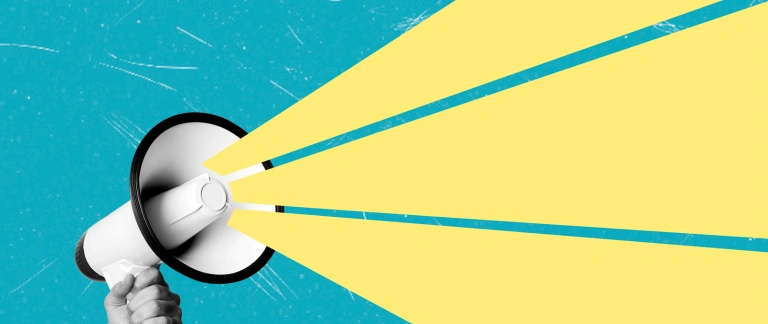 A black and white photo of a hand holding a megaphone on a stylised blue background with yellow sound lines coming out of it