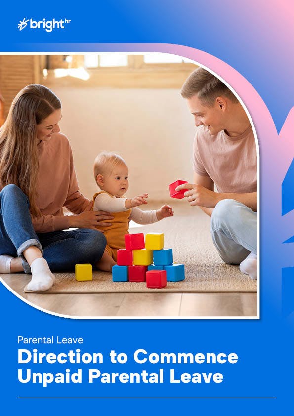 A family is playing with a toddler on a wooden floor. They are surrounded by colorful blocks of toys. The background is a blue color with a white border.