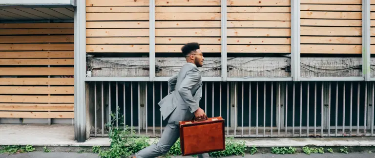 When does staff lateness or absence become misconduct?