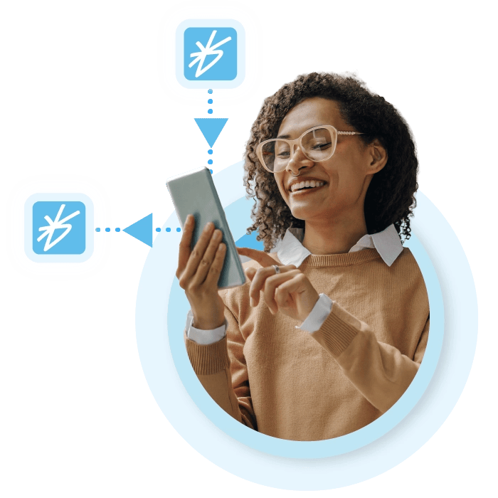 Woman smiling and using the HR software app from BrightHR Woman smiling and using the HR software app from BrightHR