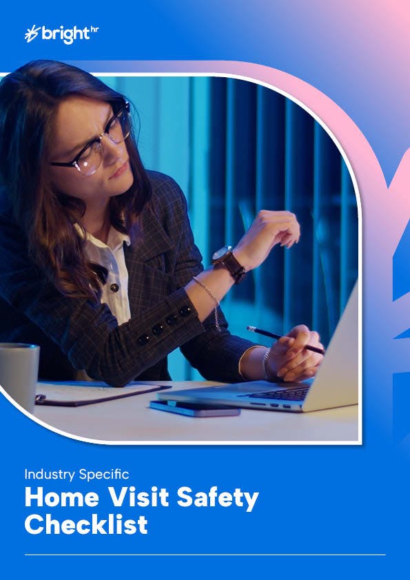 Employee at desk using laptop