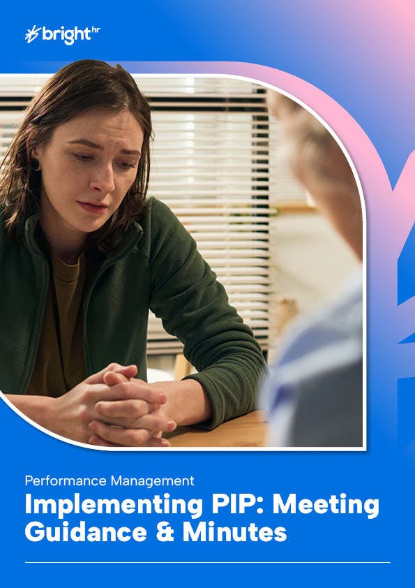 Picture of upset looking staff member in meeting