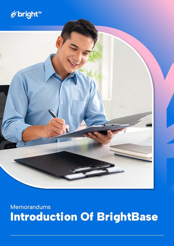 employee at desk signing documents
