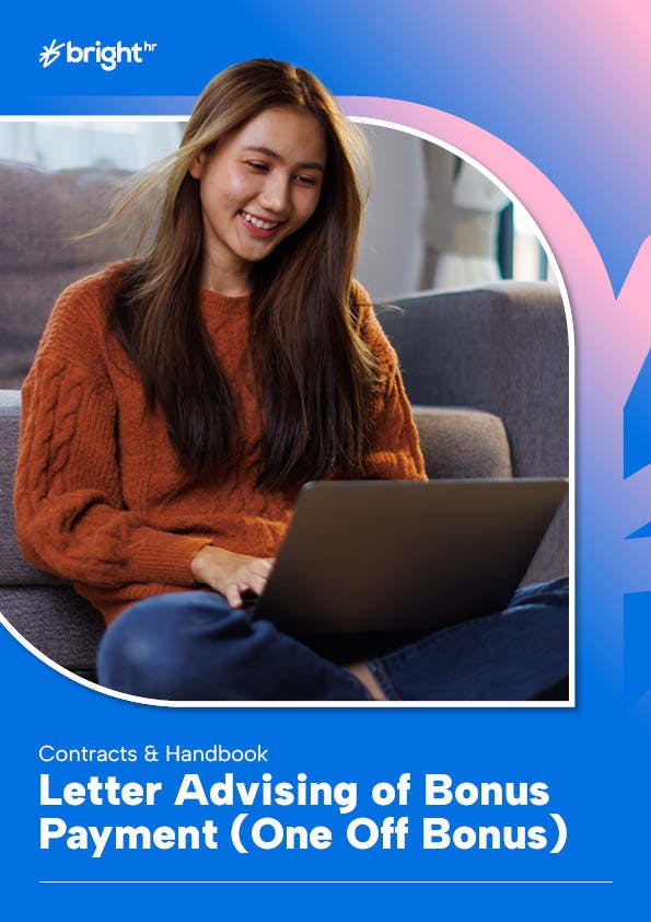 woman on couch using laptop