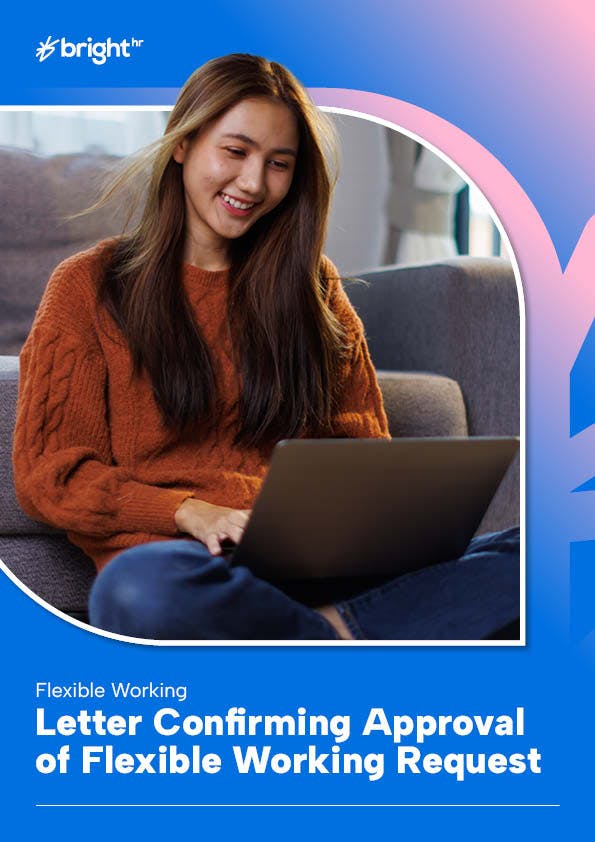 woman on couch using laptop