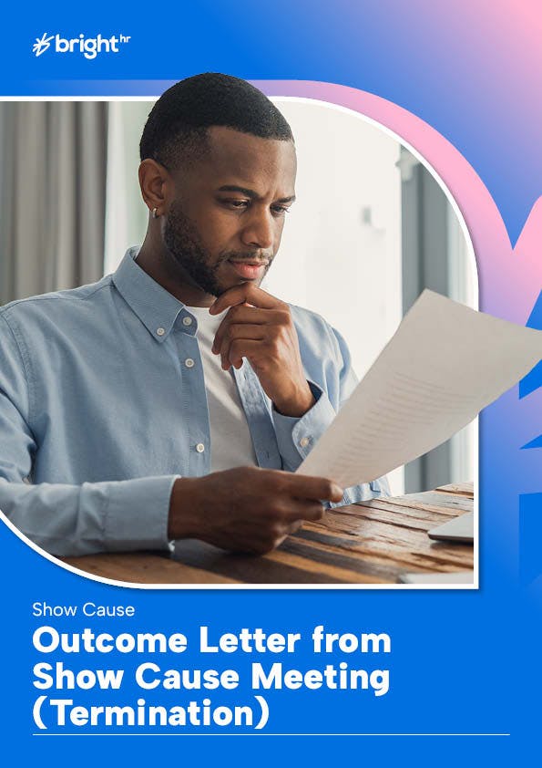 picture of person reading document at desk