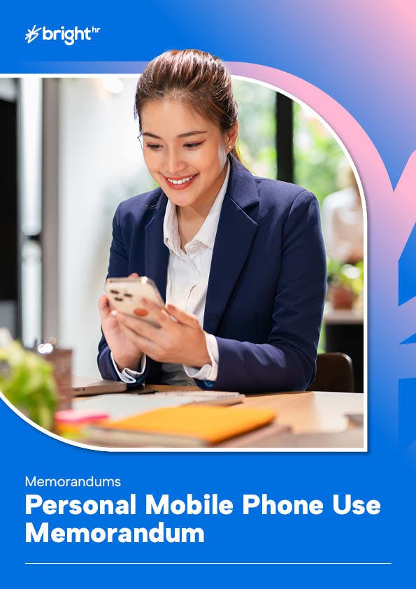 staff member using phone at desk