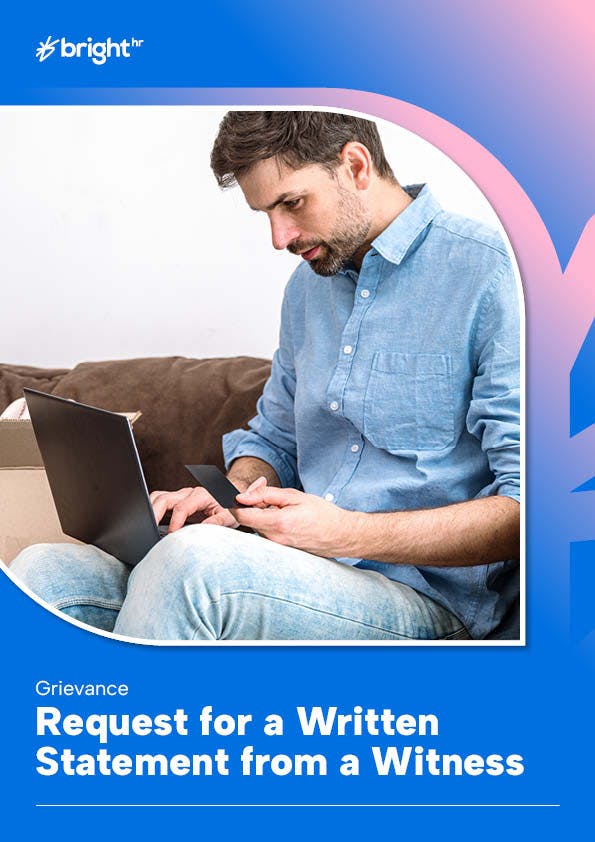 picture of a man sitting on a couch using a laptop