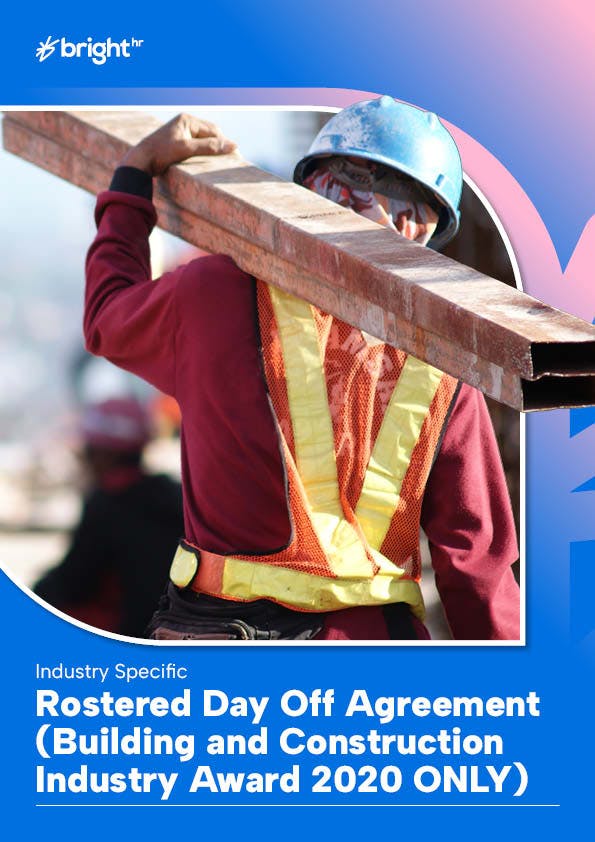 Construction worker carrying steel