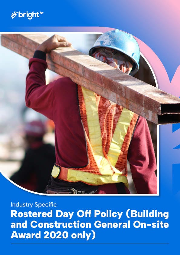 Construction worker carrying steel